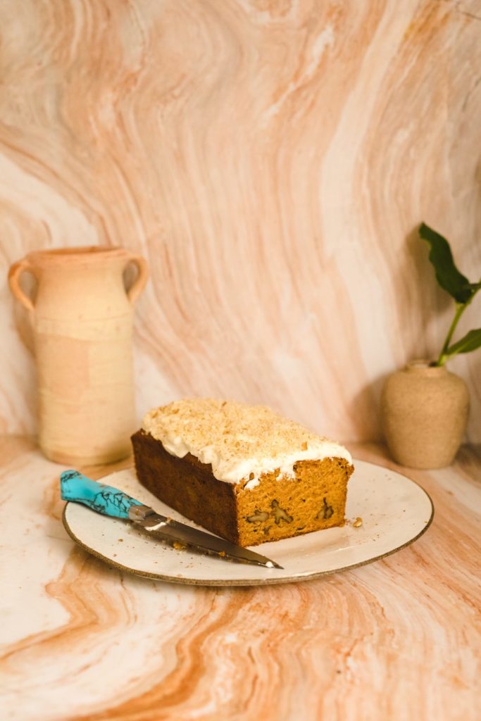 Spiced Carrot Loaf With Maple Cream Cheese Frosting & Crushed Walnuts